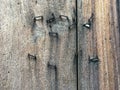 Rusty staples on Old planked wood texture background, Brown colour, Vintage wooden wall, Abstract background Royalty Free Stock Photo