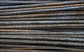 Rusty steel bars closeup, reinforcement on construction site, background.