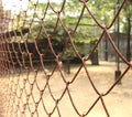 Rusty steel net wire mesh fence Royalty Free Stock Photo