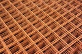 Rusty steel rebar grids, abstract construction backround