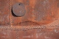 Rusty steel with rivets Royalty Free Stock Photo