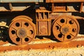 Rusty steel wheels of shiplift transfer system at an old shipyard Royalty Free Stock Photo