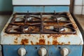 A rusty stove top in a neglected kitchen showcasing the need for effective household cleaning solutions Royalty Free Stock Photo