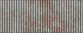 Rusty striped metal wall background Royalty Free Stock Photo