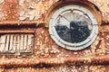 Rusty submarine armoured porthole or window metal background.