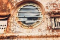 Rusty submarine armoured porthole or window metal background. Royalty Free Stock Photo