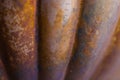 Rusty texture.Grunge photo wallpaper.Ribbed metal rusty surface.Ribbed shiny surface.Shabby metal background with rust