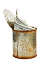 Rusty tin can with US currency Royalty Free Stock Photo