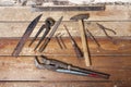 Rusty tools on wooden flooring