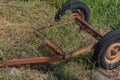 Rusty trailer frame and wheel assembly