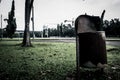 A rusty trash bin made from zinc in city park photo taken in Jakarta Indonesia