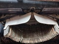 Rusty typewriter showing the exposed key mechanisms. Royalty Free Stock Photo