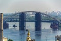 Rusty unfinished bridge in Kiev, Ukraine. Known for its unusual design and this is very popular among videographers. Concept,