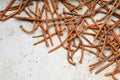 Rusty nails on a cement metal background Royalty Free Stock Photo