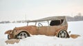 Rusty Vintage Convertible Car in Snow