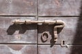 Rusty, vintage door latch , frontal view Royalty Free Stock Photo