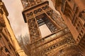 Rusty and vintage look at Eiffel Tower surrounded between two buildings Royalty Free Stock Photo