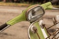 Rusty vintage mod green scooter bike handlebar, mirrors and headlamp