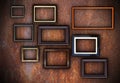 Rusty wall full of empty frames Royalty Free Stock Photo