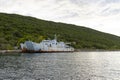 A rusty warship at the pier, off the coast of the Adriatic Sea Royalty Free Stock Photo