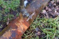 Rusty water pipe with leaking tap Royalty Free Stock Photo