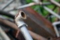 Rusty water pipe. Stack of scrap metal. Recycling and garbage concept Royalty Free Stock Photo