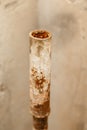 Rusty water pipe after thirty years of operation. Royalty Free Stock Photo