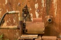 Rusty Water Turbine Generator - Moldy Peeled Concrete Wall Texture/ Vintage Garden Royalty Free Stock Photo