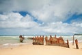 Rusty wreck on australian beach during the day Royalty Free Stock Photo
