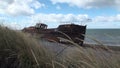 Rusty wreckage shipwreck Amadeo of cargo ship on beach ocean in San Gregorio.