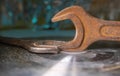 Rusty wrenches on a beautiful bokeh background Royalty Free Stock Photo