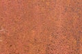 Rusty yellow-red textured metal surface. The texture of the metal sheet is prone to oxidation and corrosion. Grunge Royalty Free Stock Photo