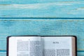 Ruth open Holy Bible Book on a wooden background with copy space Royalty Free Stock Photo