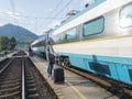 Ruzomberok, Slovakia, August 30, 2020: international train arrived at train platform with group of waiting people at