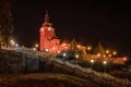 Church at town Ruzomberok Slovakia illuminated in red due event Red Wednesday 2020 Royalty Free Stock Photo