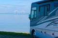 RV at beach with Tampa Bay Sunshine Skyway Bridge Royalty Free Stock Photo