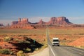 RV camper van, chevrolet, in front of the scenic Monument Valley Landscape Royalty Free Stock Photo