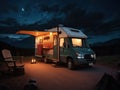 RV parked in the woods at night with a campfire Royalty Free Stock Photo