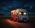 RV parked in the woods at night with a campfire Royalty Free Stock Photo