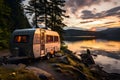 RV recreation vehicle parked next to lake during summer time