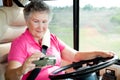 RV Senior - Woman Using GPS Royalty Free Stock Photo