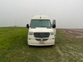 A RV Sprinter Van stuck in the mud in the Wall, SD boondocking spot in Badlands National Park Royalty Free Stock Photo