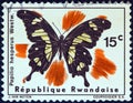 RWANDA - CIRCA 1965: A stamp printed in Rwanda from the `Rwanda butterflies` issue shows a Papilio hesperus butterfly, circa 1965.