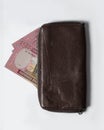 5000 Rwandan franc notes inside a purse