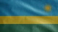 Rwandese flag waving in the wind. Close up of Rwanda banner blowing soft silk Royalty Free Stock Photo