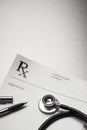 RX prescription form stethoscope and pen Royalty Free Stock Photo