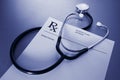RX prescription form and stethoscope on stainless Royalty Free Stock Photo