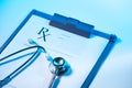 RX prescription form and stethoscope on stainless Royalty Free Stock Photo