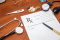 Rx prescription with pills, stethoscope, thermometer Royalty Free Stock Photo