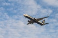 Ryanair airliner jet approach to land with landing gear displayed, seen from below